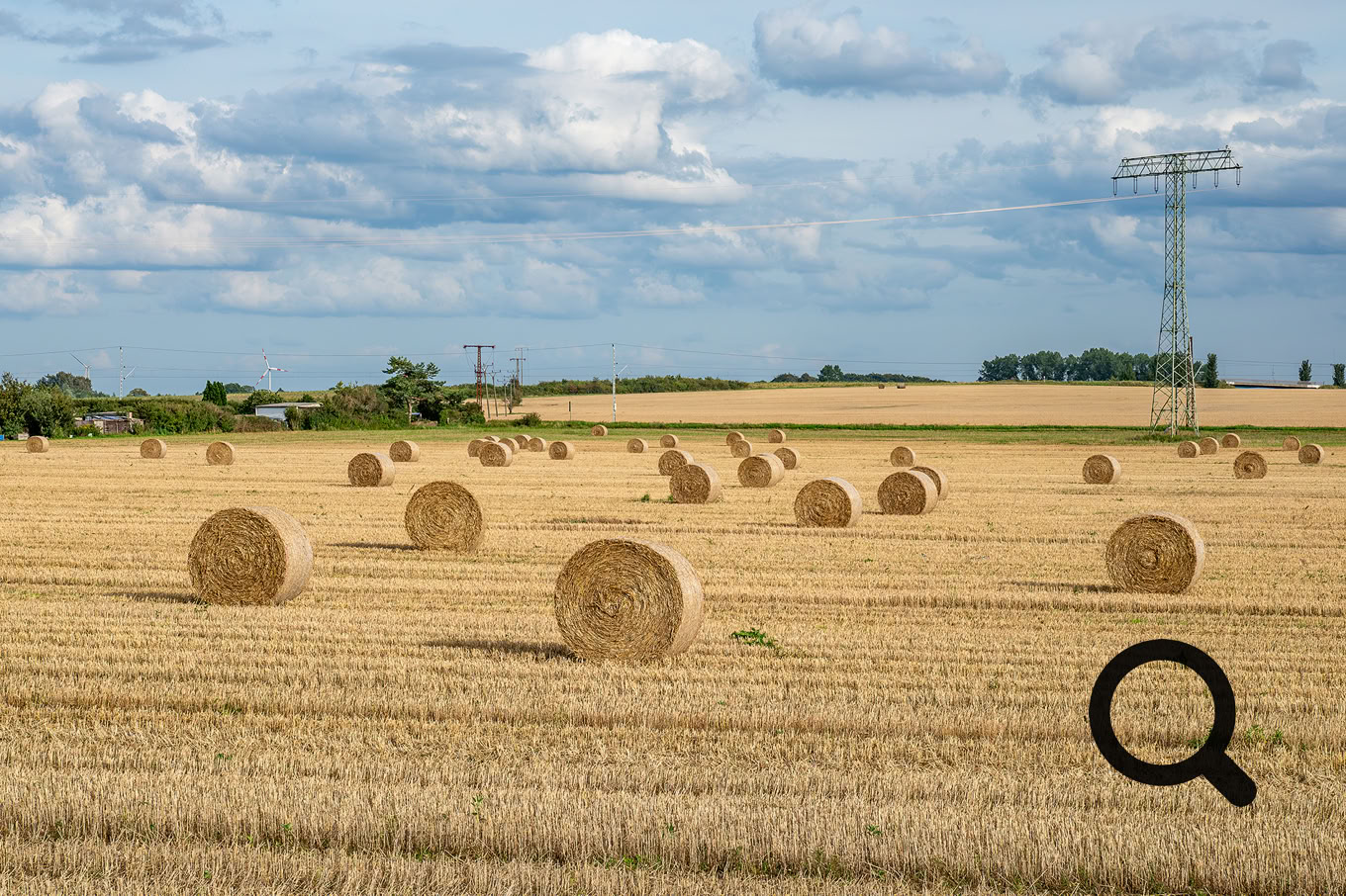 Landwirte bei der Strohernte in Ribnitz-Damgarten